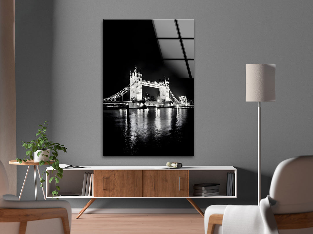 Tower Bridge at Night: A striking black-and-white depiction of Tower Bridge under the night sky.
