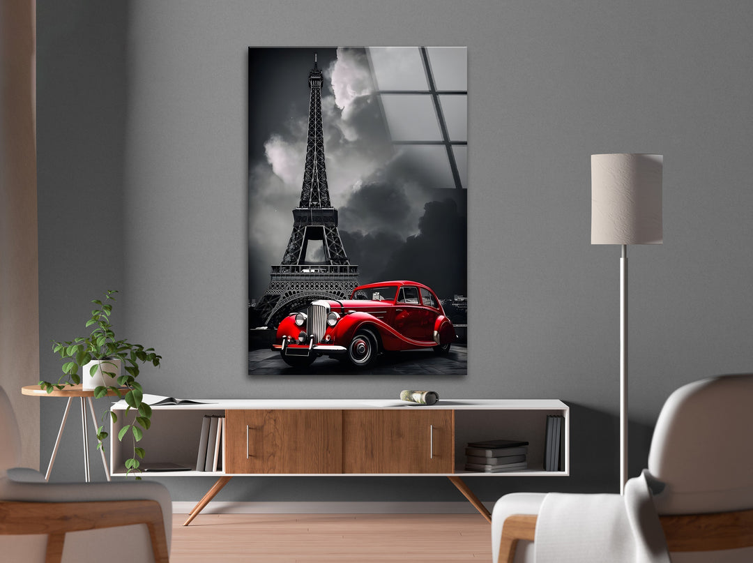 Bring a touch of Parisian charm into your space with this black and white glass artwork of a red vintage car and the Eiffel Tower.

