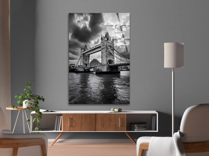 High-definition glass wall art capturing the grandeur of Tower Bridge against a dramatic sky.
