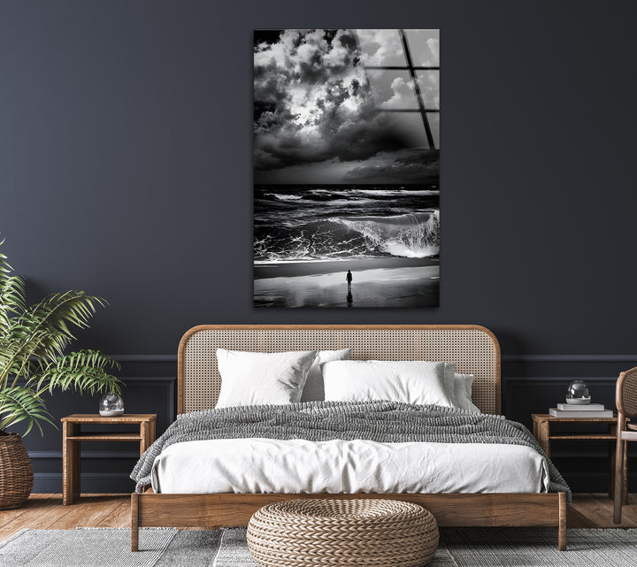 A stunning black and white framed art composition capturing the power of the sea under a dramatic sky.

