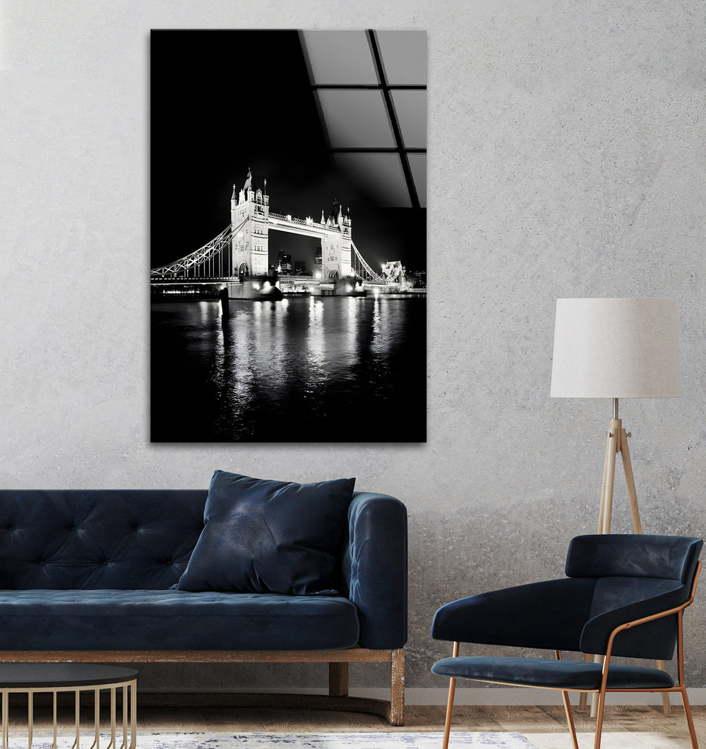 Tower Bridge at Night: A dramatic black-and-white rendition of the famous London bridge.
