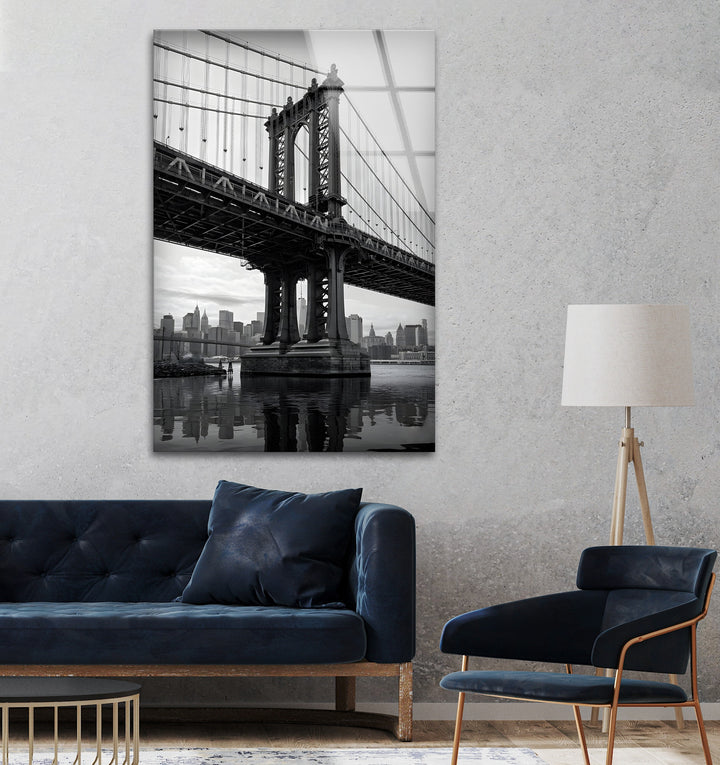 Modern cityscape glass print featuring the Manhattan Bridge in monochrome.
