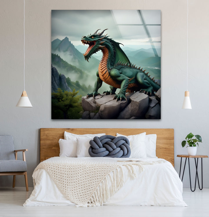 A green dragon perched on a rocky mountain, showcasing its fiery energy on detailed glass wall art.
