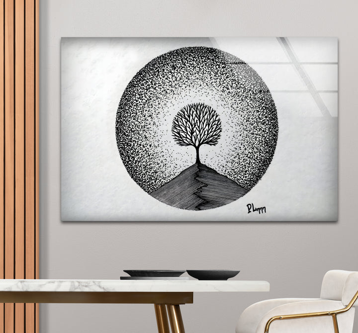 Chic black and white framed art highlighting the natural elegance of a tree’s branches.