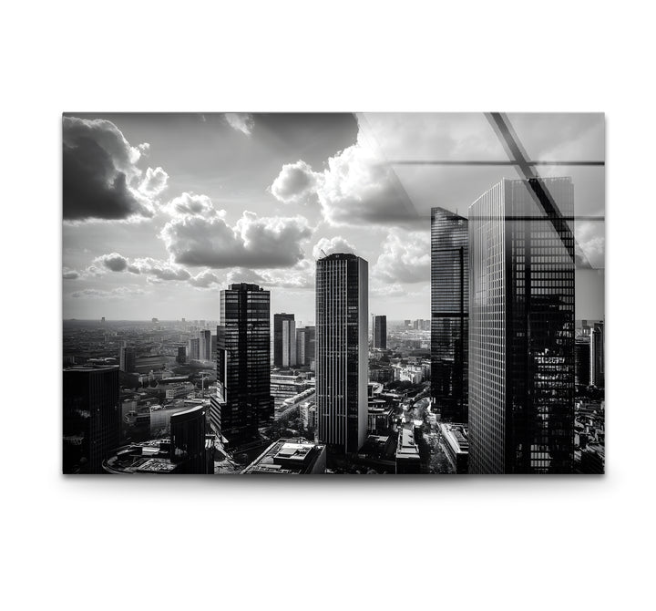 Striking black and white wall art featuring a dramatic cityscape with towering skyscrapers.