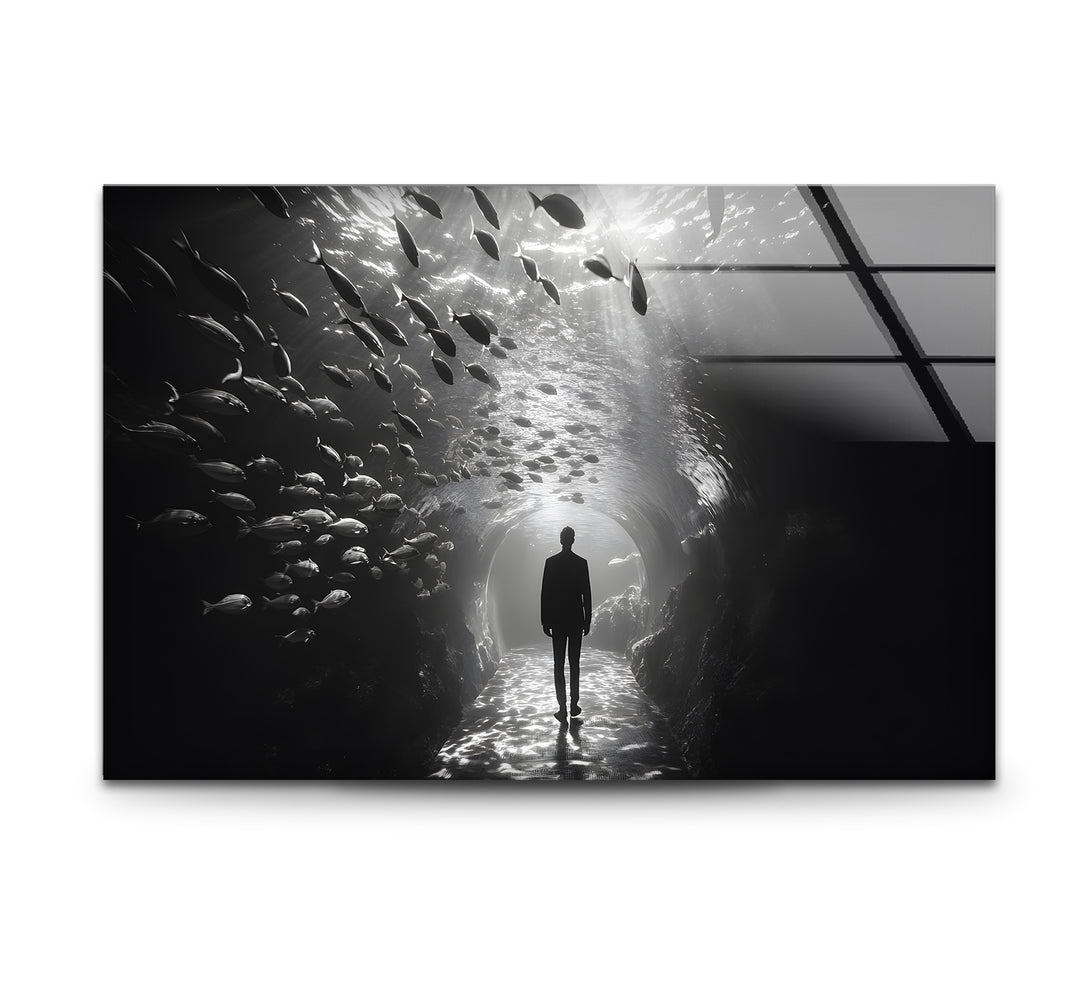 Captivating black and white wall art featuring a man walking through an underwater aquarium.