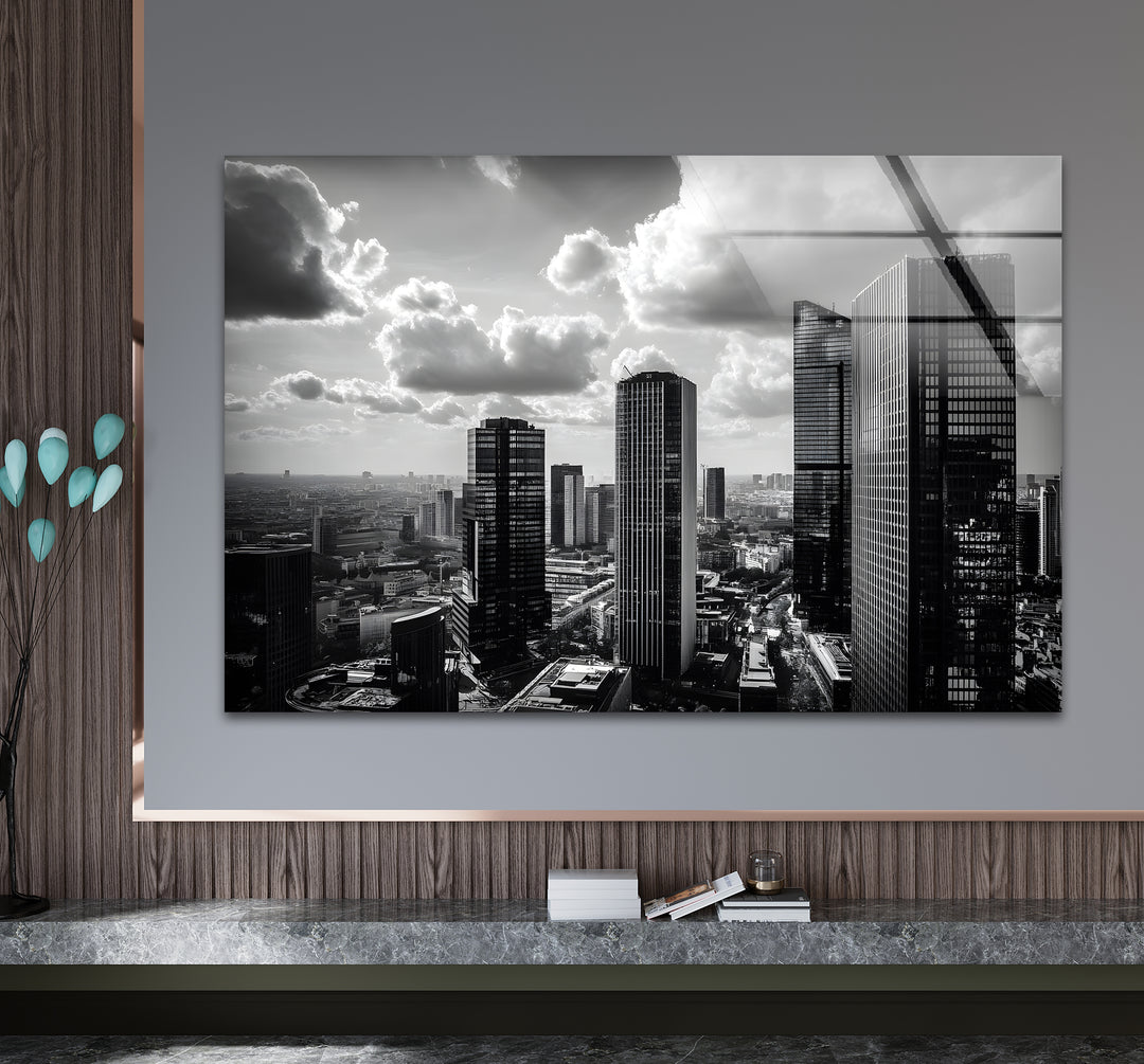 Elegant black and white artwork showcasing an urban landscape under a moody sky.