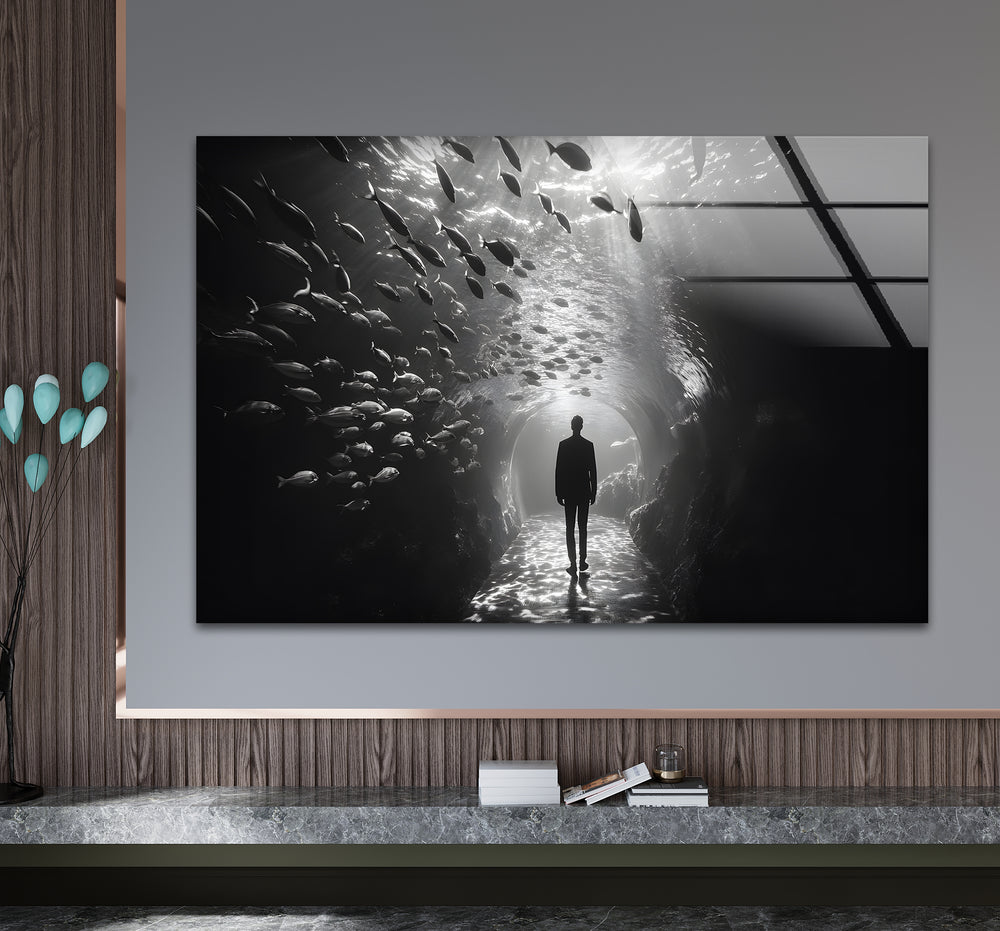 Elegant black and white artwork showcasing the surreal beauty of a man in an aquarium.