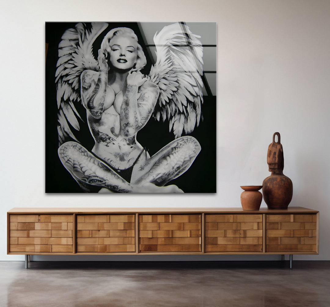 Modern glass wall art showcasing sensual naked art and erotic paintings
