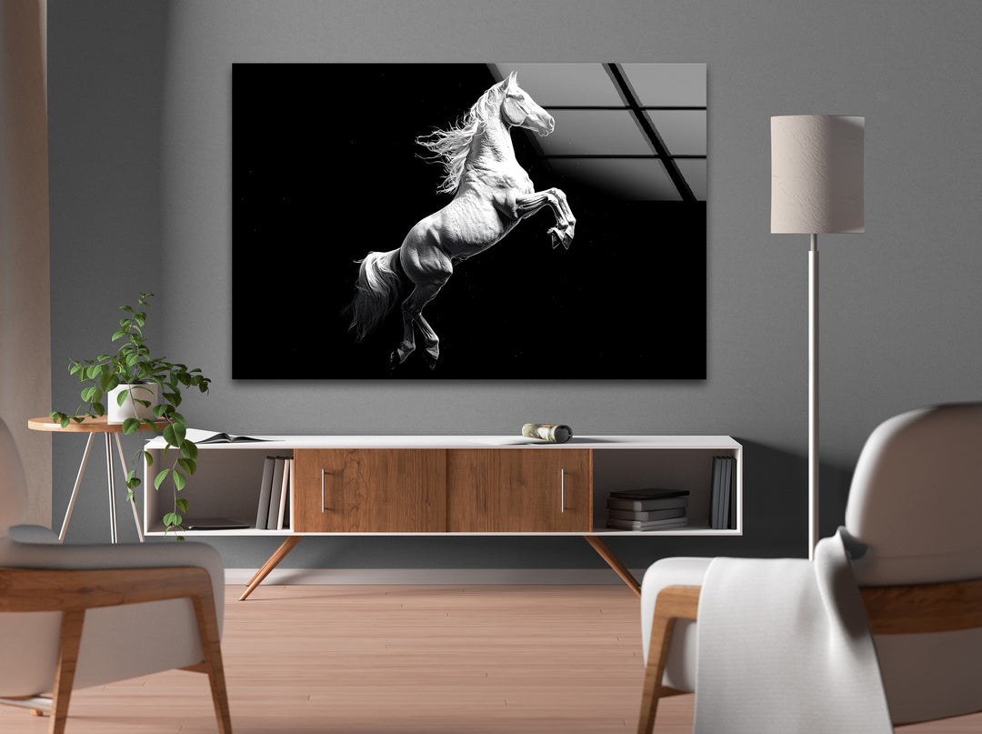 A breathtaking rearing white horse on glass wall art, adding power and sophistication to any interior.