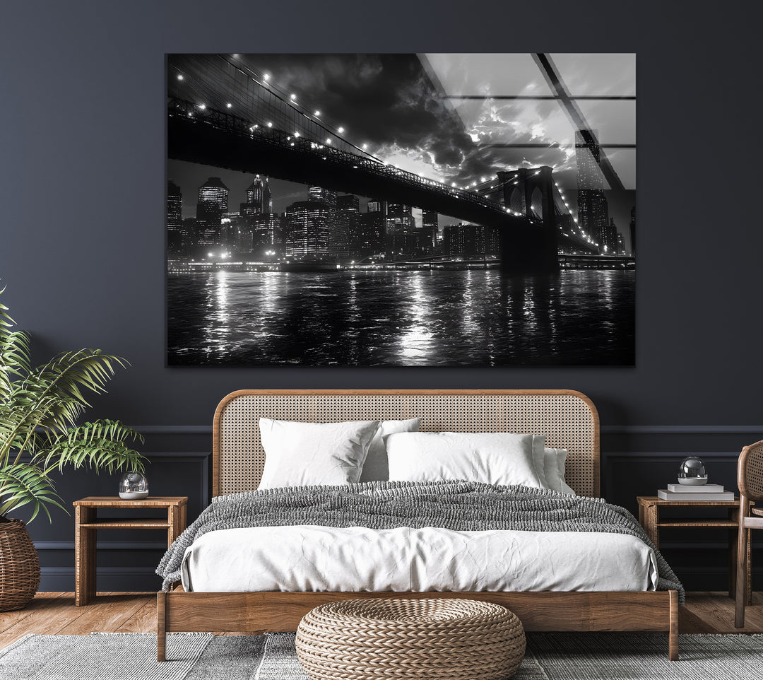 A dramatic urban cityscape featuring the Brooklyn Bridge and skyline, beautifully printed on glass wall art.
