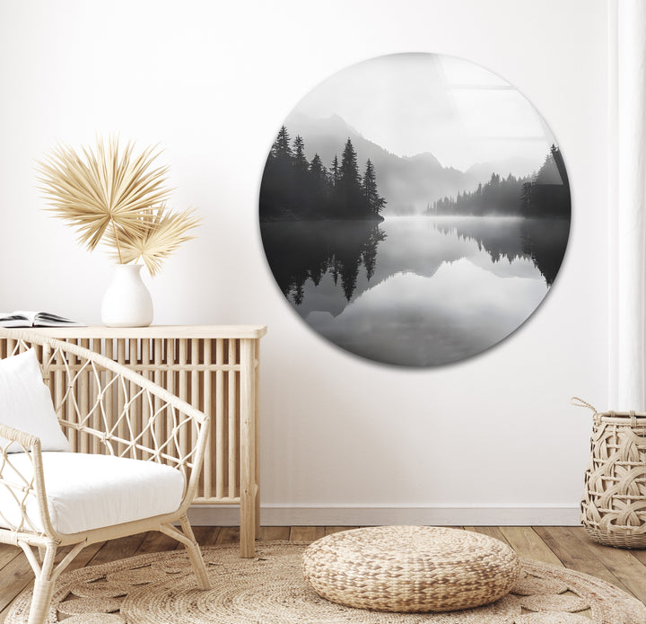 Misty Mountain Reflection: A calming and minimalist portrayal of mountains reflected in still water, ideal for any space.
