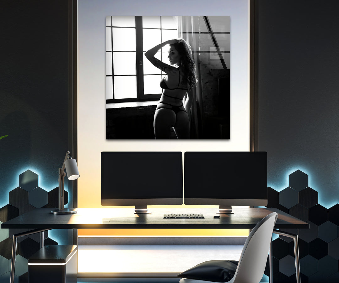 Modern glass wall art with a blend of erotic and sexy artistic elements
