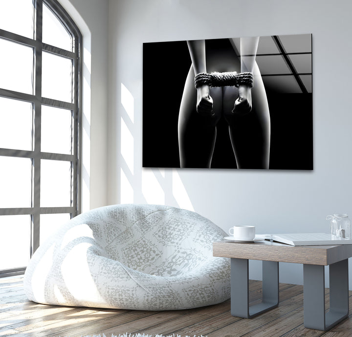 Modern glass wall art with a blend of erotic and sexy artistic elements
