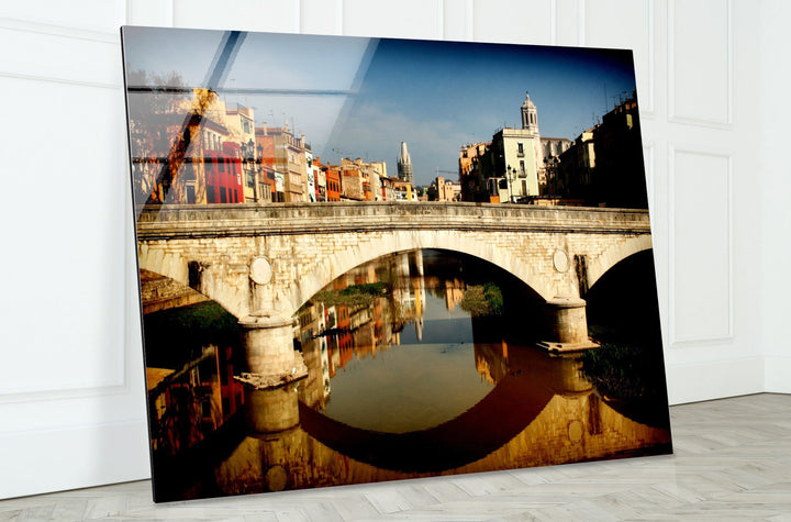 Girona Bridge Glass Wall Art – Scenic View of Spanish City with Reflection in River