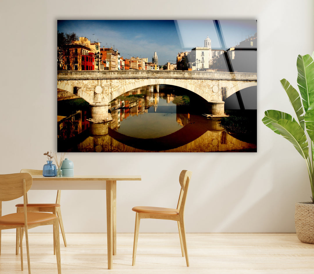 Girona Bridge Glass Wall Art – Scenic View of Spanish City with Reflection in River