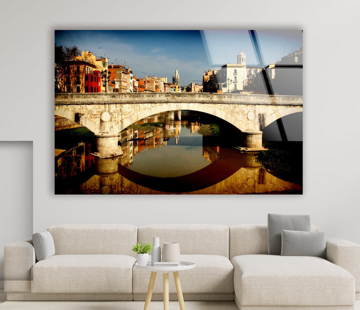 Girona Bridge Glass Wall Art – Scenic View of Spanish City with Reflection in River