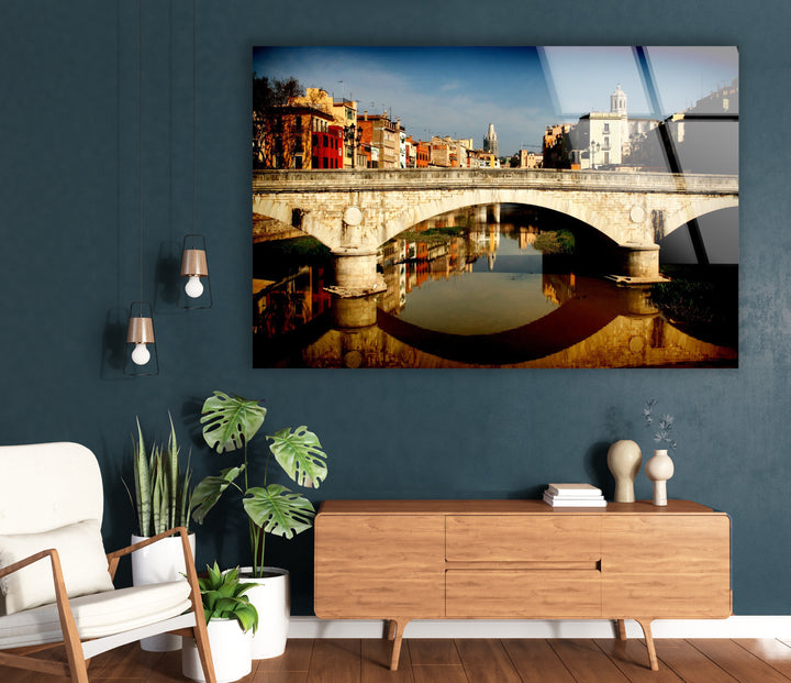 Girona Bridge Glass Wall Art – Scenic View of Spanish City with Reflection in River