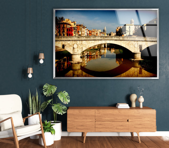 Girona Bridge Glass Wall Art – Scenic View of Spanish City with Reflection in River