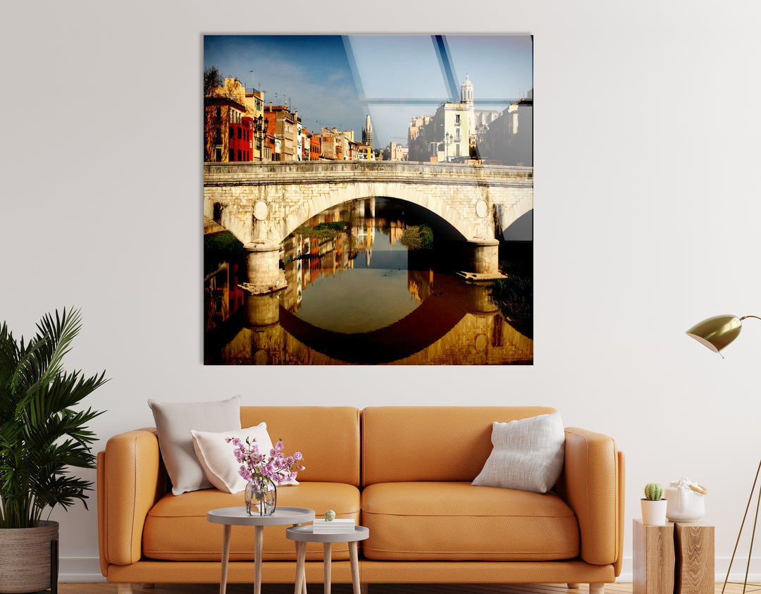 Girona Bridge Glass Wall Art – Scenic View of Spanish City with Reflection in River