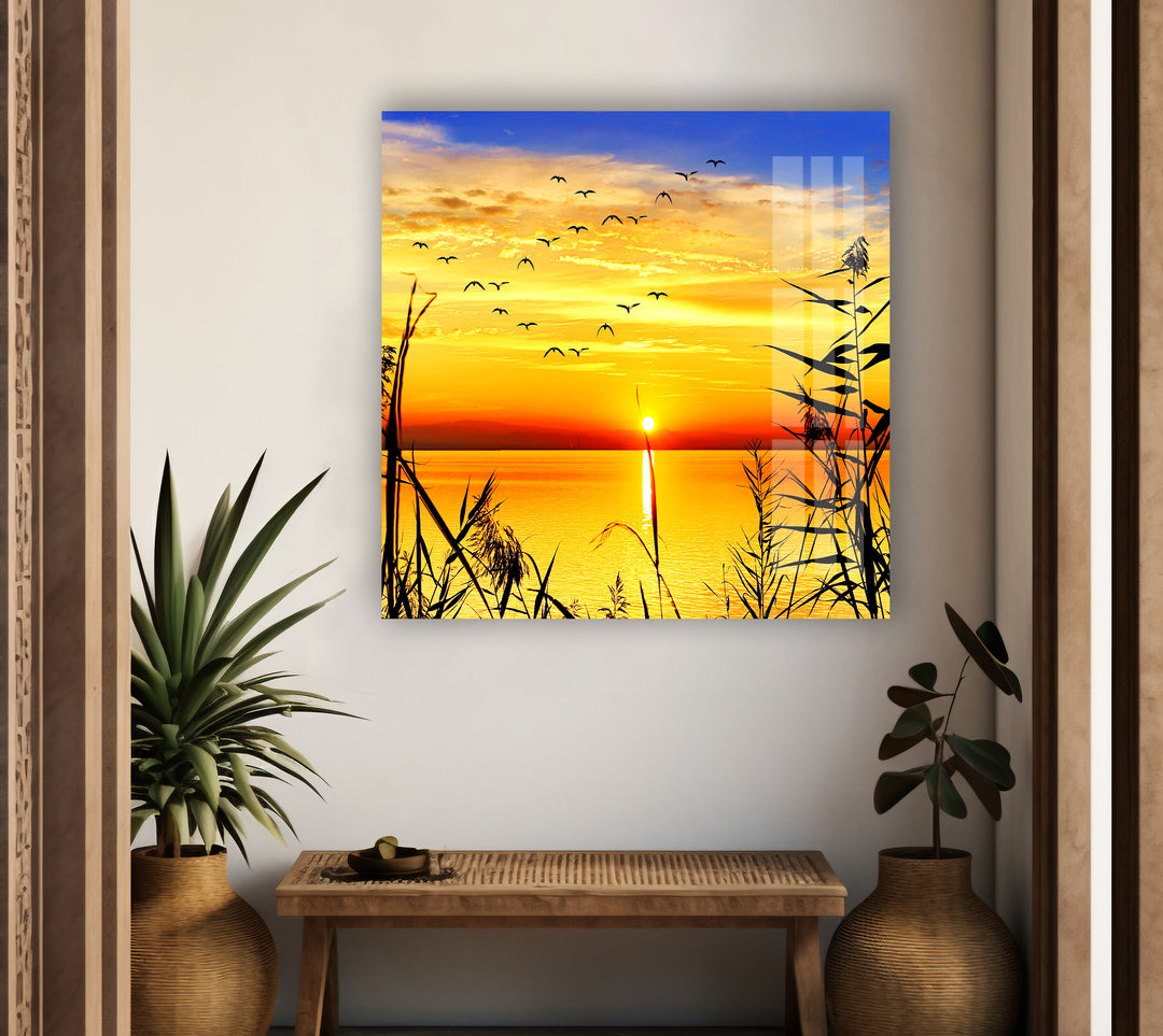 Grass Upon Water By Sunset Glass Wall Art