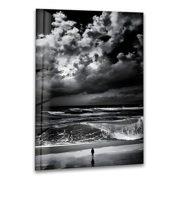 A breathtaking black and white glass wall art piece capturing the intensity of the ocean and stormy sky.

