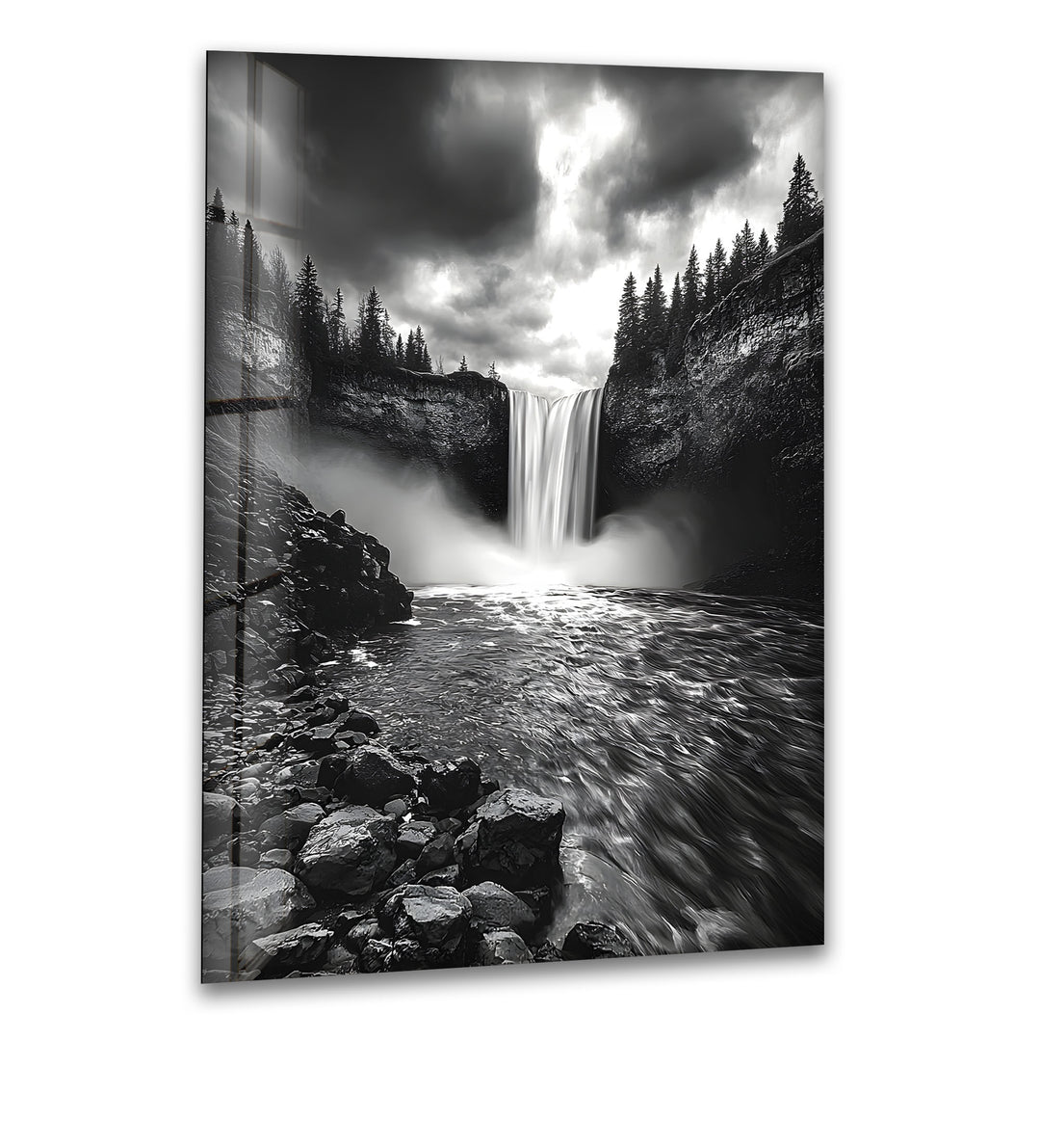 A breathtaking black and white glass wall art featuring a powerful waterfall surrounded by rugged nature.