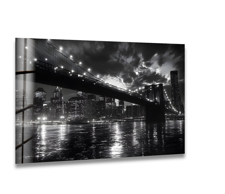 A breathtaking black and white glass wall art featuring the illuminated Brooklyn Bridge and New York City skyline.
