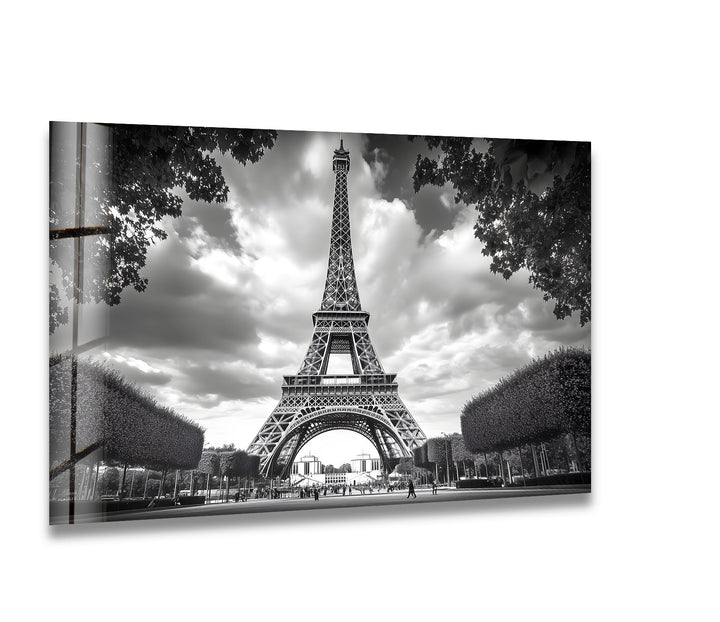 A stunning black and white glass wall art featuring the iconic Eiffel Tower in a dramatic cityscape.