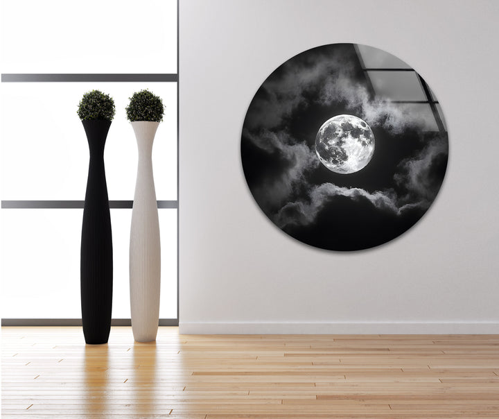 Modern glass wall art featuring a glowing moon surrounded by dramatic clouds, perfect for nature lovers.