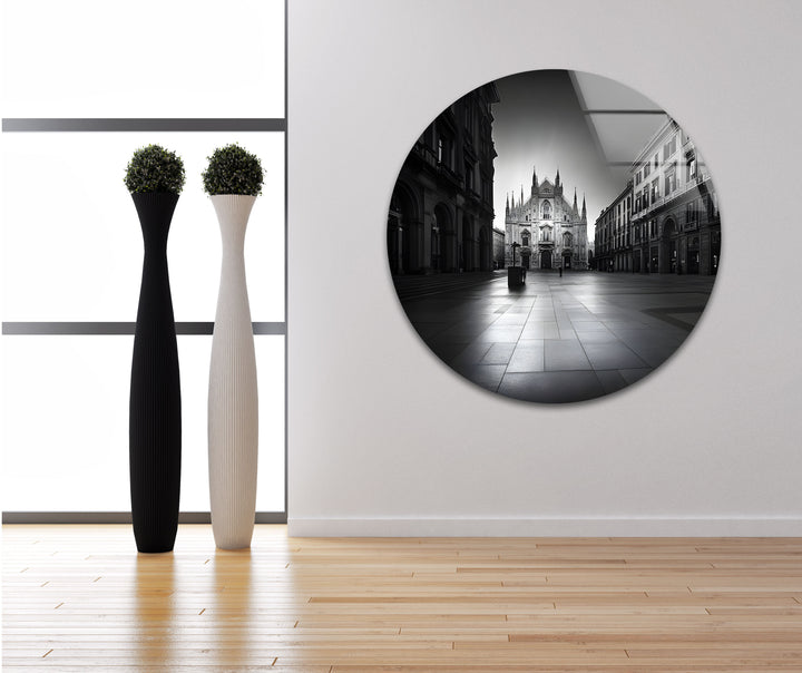 Striking urban photography of Duomo di Milano, transformed into elegant black and white glass wall art.
