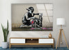 a painting of a man sitting on a bench with a sewing machineExplore our collection today and discover the perfect Banksy artwork for sale that speaks to you. With our extensive range of Banksy prints, you are sure to find the ideal piece to complement your home decor. Elevate your space with the provocative and iconic style of Banksy, and make a statement with our exclusive glass wall art.