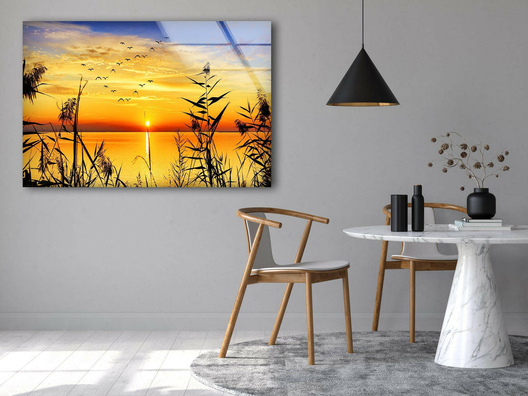 Grass Upon Water By Sunset Glass Wall Art