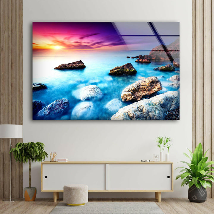 Vivid Sunset Over Rocks Glass Wall Art