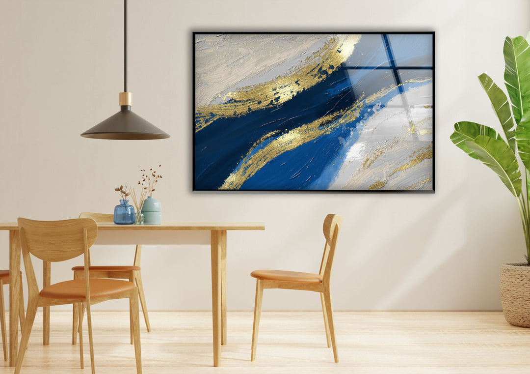 Blue and Gold Modern Art Glass Wall Art Our modern glass wall art will make your living room look better, or you can choose glass wall art for the living room to make a captivating center point. Our glass wall hanging choices make it easy and stylish to show off glass art, glass panel art, and glass panel artwork. With glass photo prints, you can keep your favorite memories alive forever as photographs or pictures on glass that look like they're coming to life.