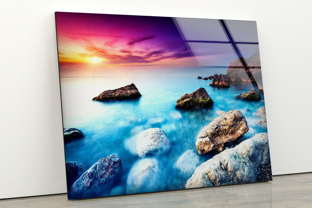 Vivid Sunset Over Rocks Glass Wall Art