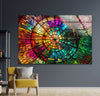 a colorful stained glass window in a room