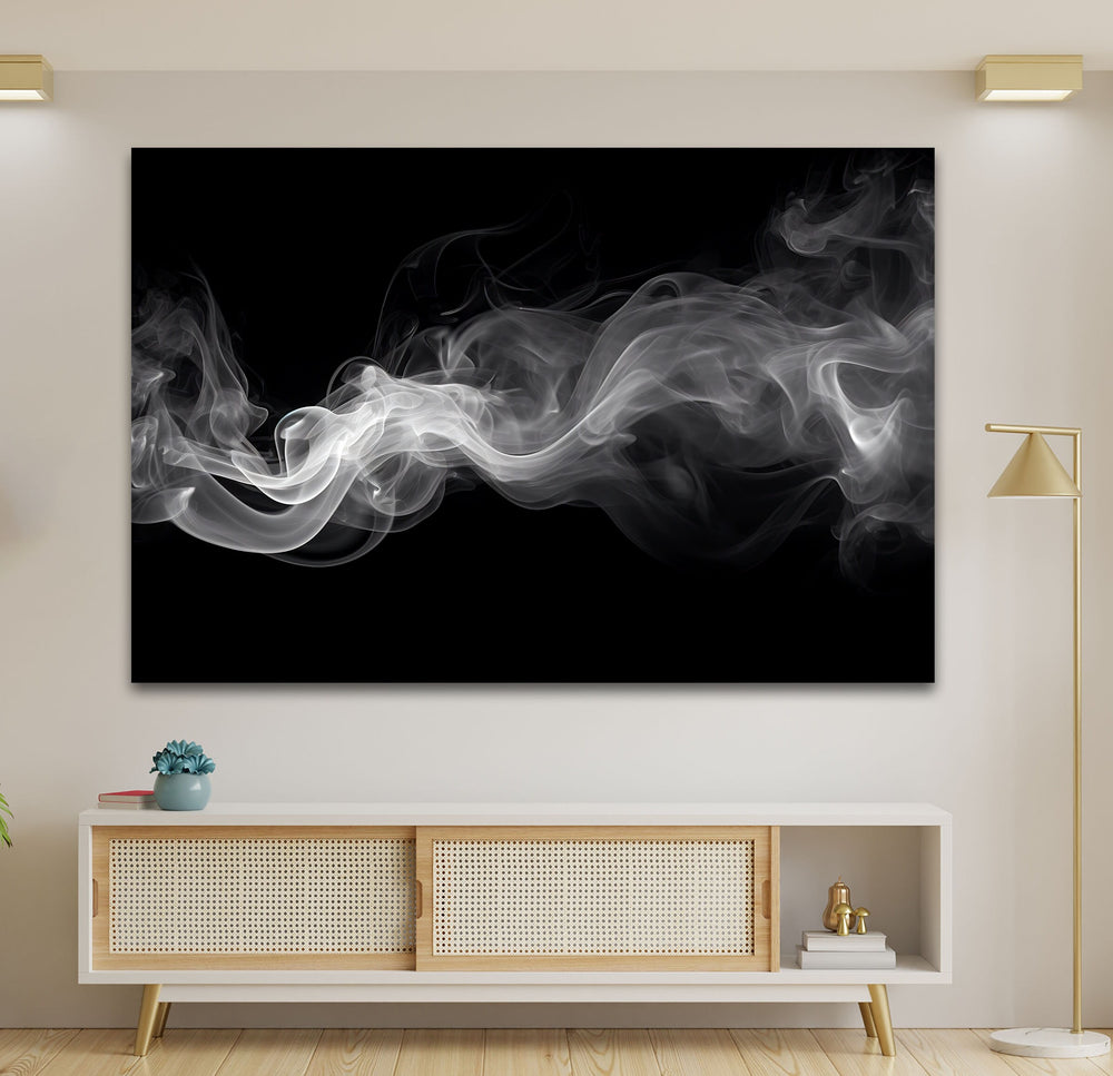 a black and white photo of smoke on a wall