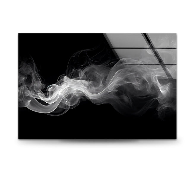 a black and white photo of smoke coming out of a window